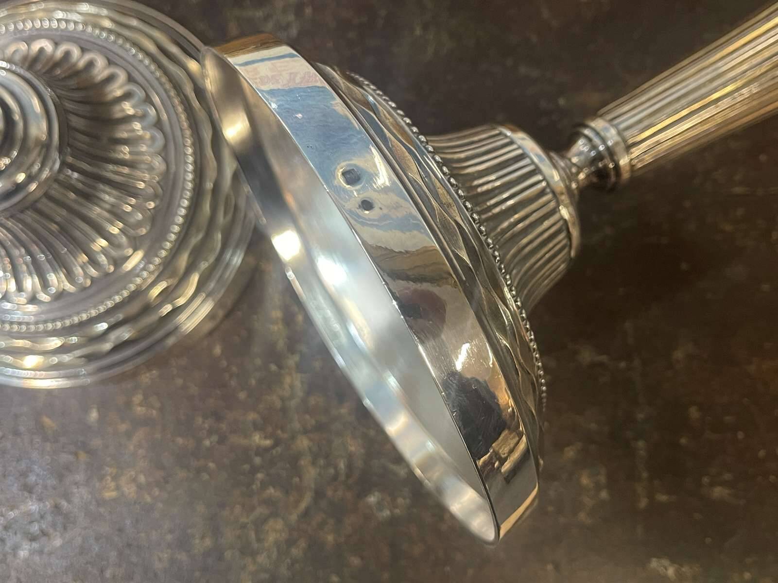 Pair of silver-plated bronze candlesticks from the early 20th century