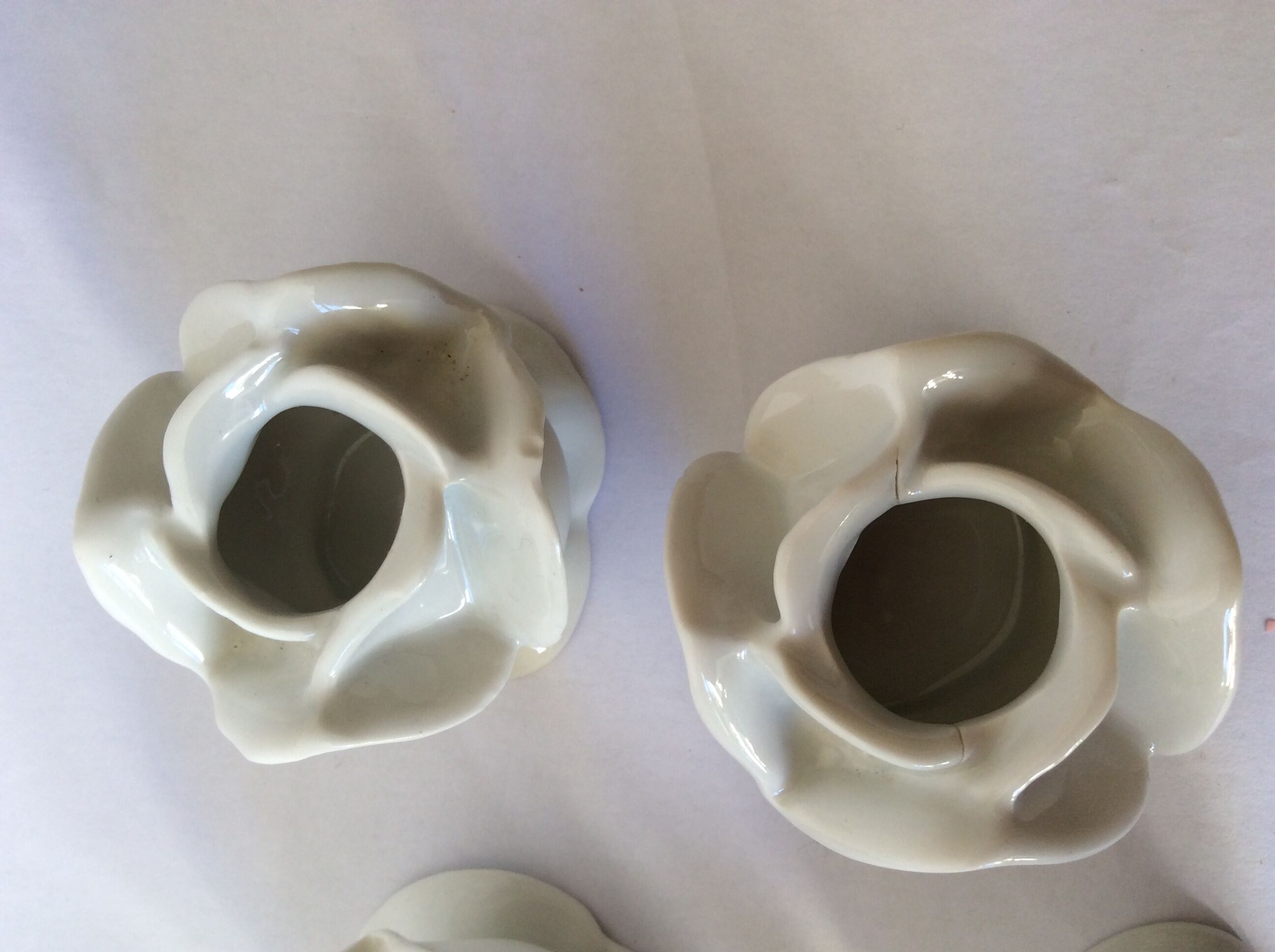 set of 6 pink candle holders in white porcelain