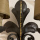Large lily flower wrought iron wall light from the 1960s.