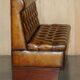 Pair of Victorian Chesterfield pub benches in leather.