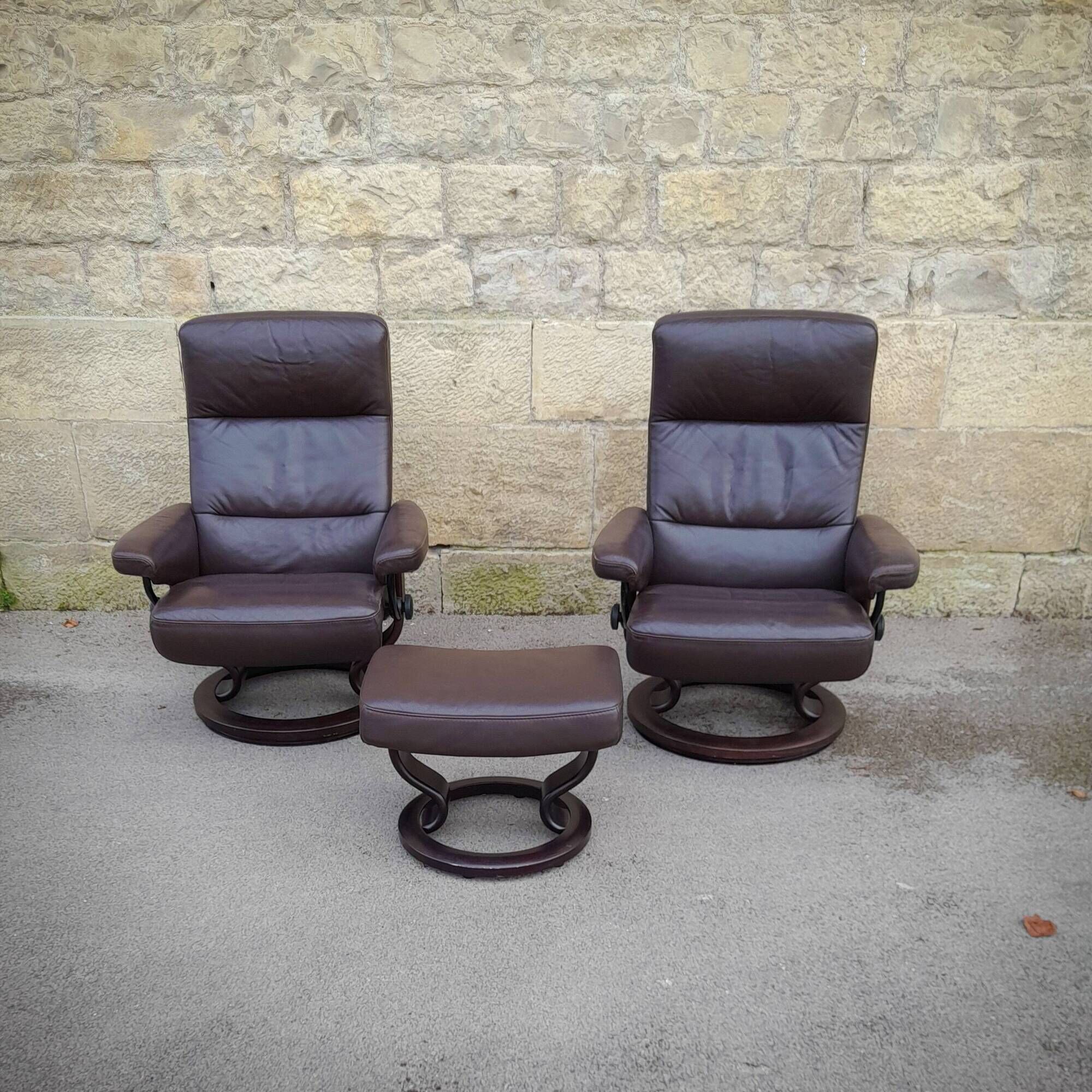 Pair of Scandinavian leather armchairs and ottoman, Ekornes, Norway, 1970