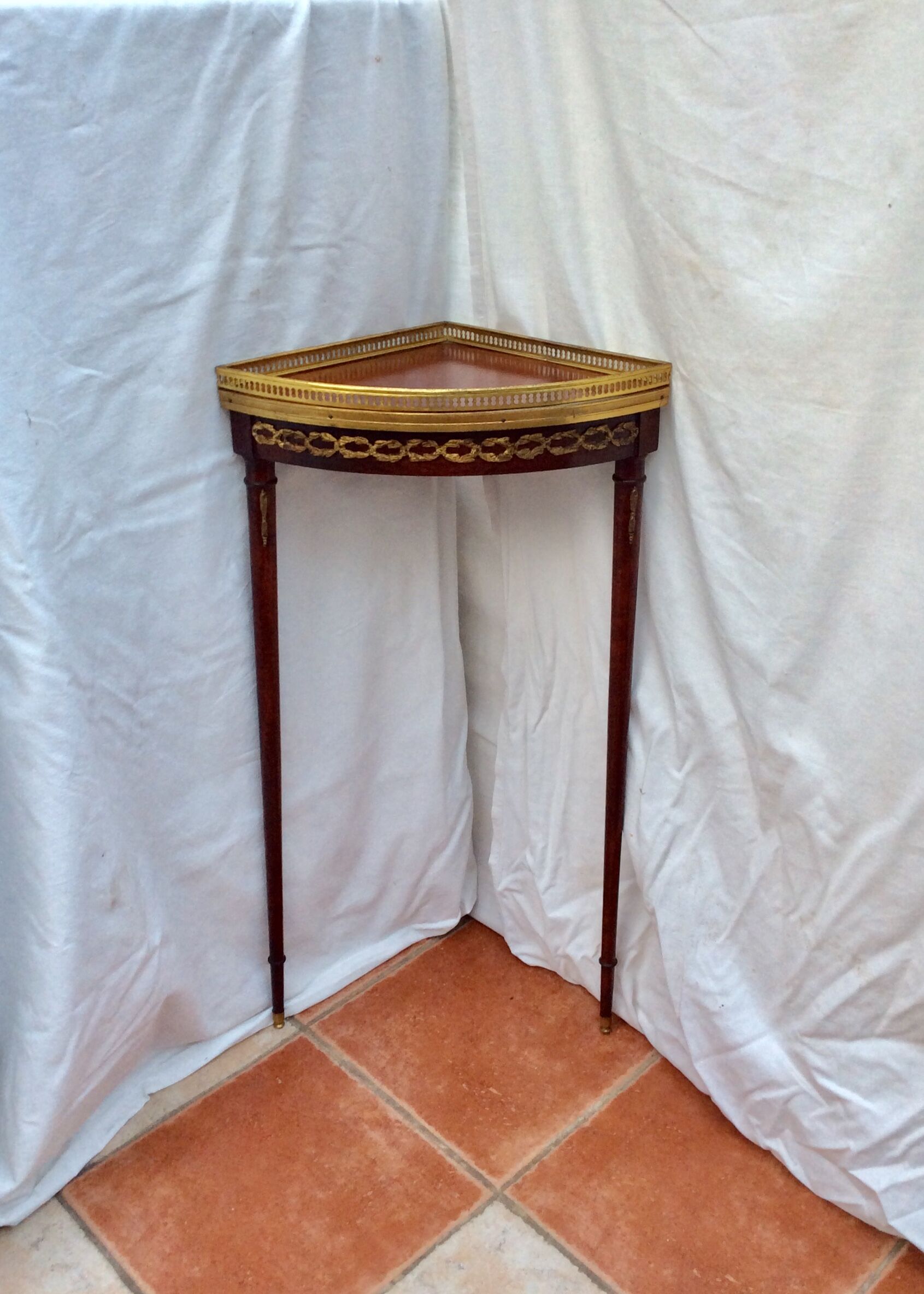 Brass wood and bronze angle console chiseled
