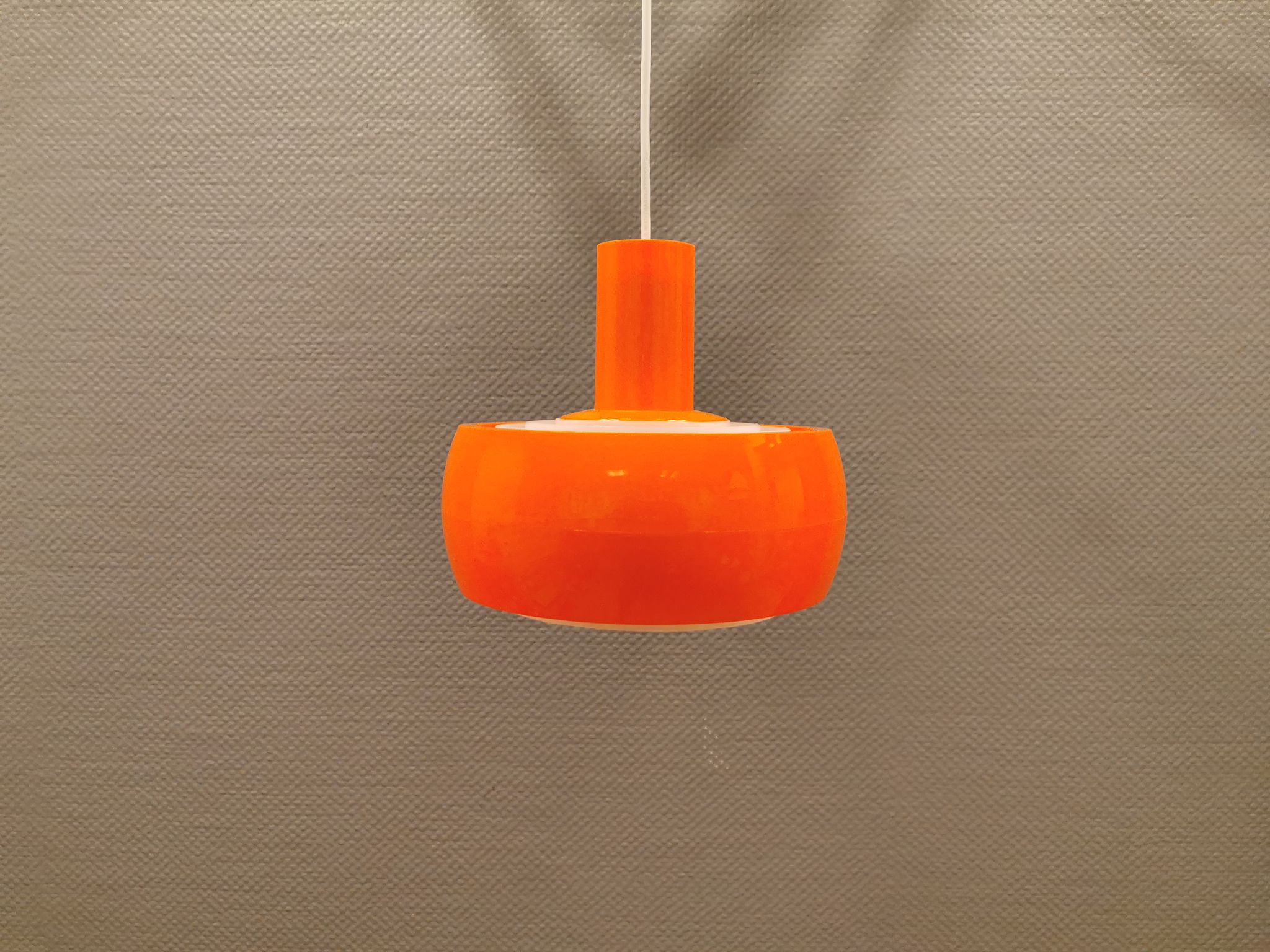 Hanging lamp, designed by Bent Karlby for Schrøder Kemi Denmark 1970s. Made of orange ABS plastic