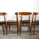 Set of 4 chairs 60s in teak and black leatherette