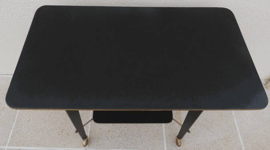 Vintage all-purpose piece of furniture from the 70s on casters with two shelves