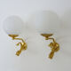 Old pair of wall sconces with carp, brass and globe in white opaline. Year 60