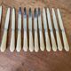 Series of 12 vintage table knives