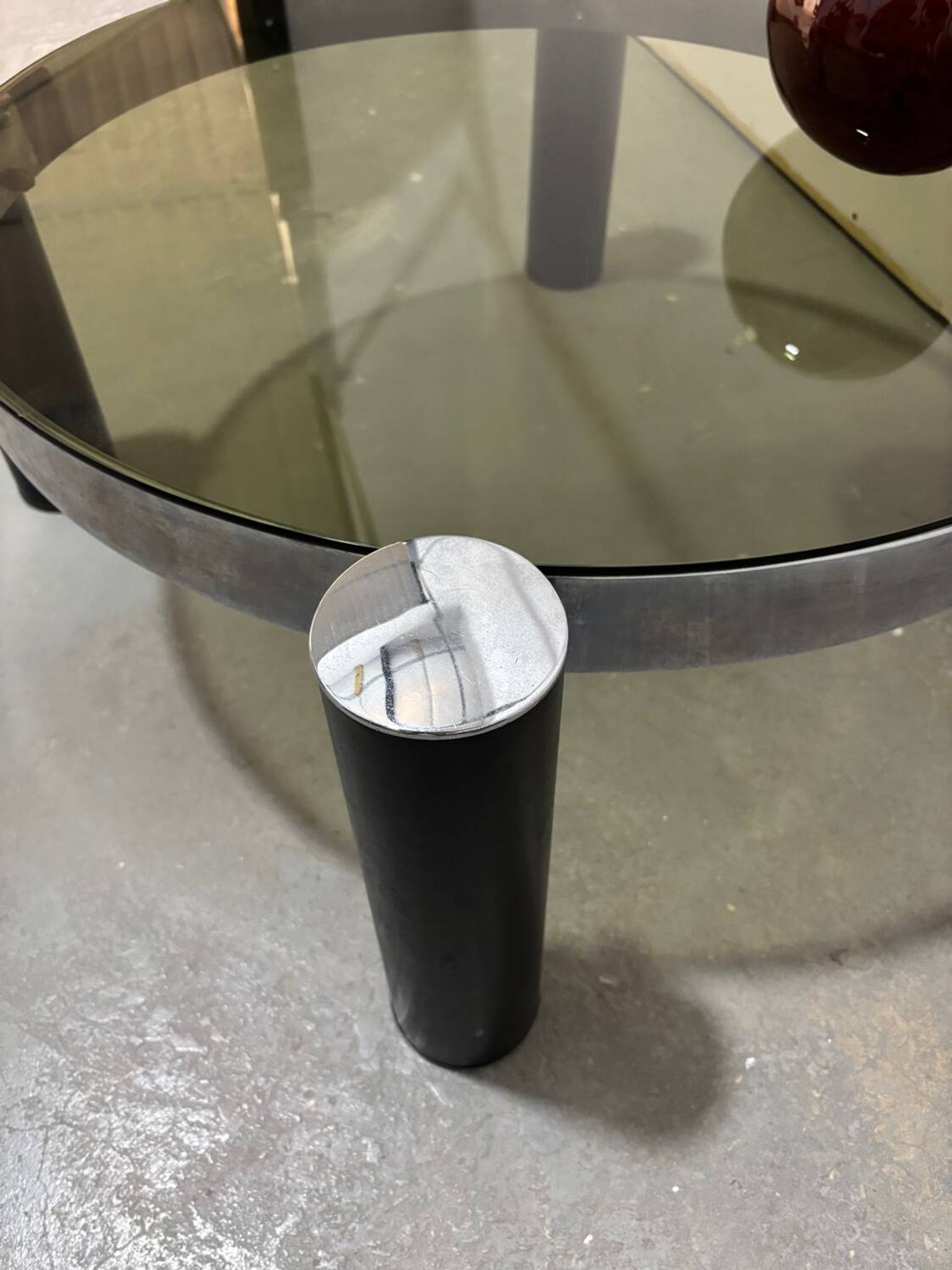 Vintage Italian design round coffee table in chrome and smoked glass.