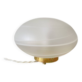 Vintage desk table lamp in antique glass with a brass base.