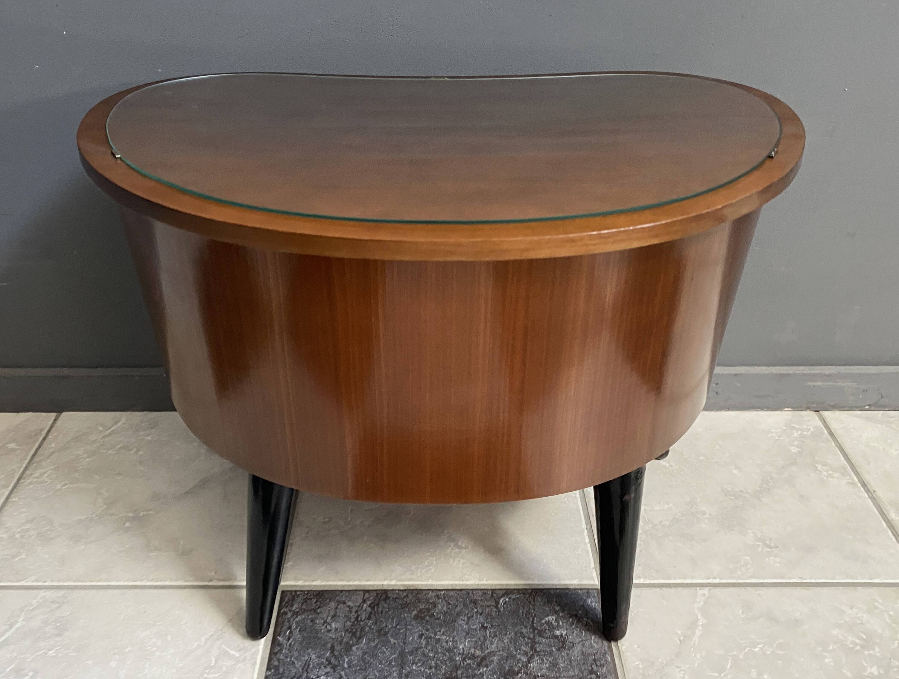 small kidney shaped cabinet with glass on top 1960s