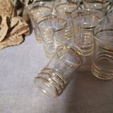 Small old glasses with gold edging
