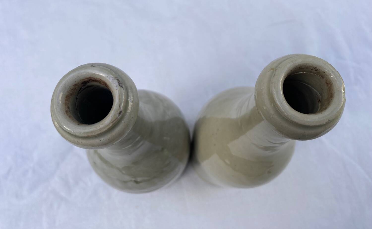 Pair of old Bossot stoneware bottles