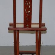 Antique Chinese folding chair with carvings, circa 1900-1920.