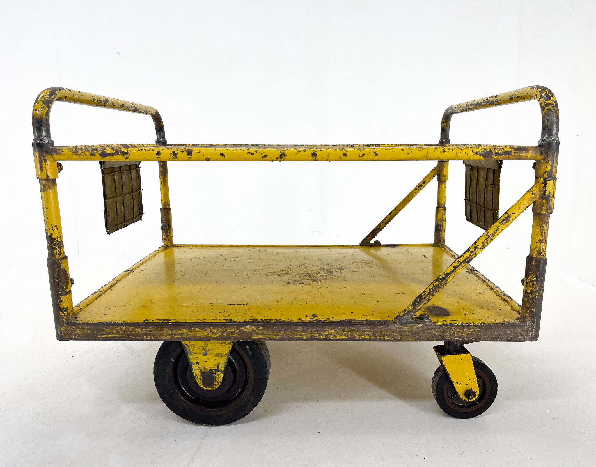 Vintage industrial coffee or side table on wheels