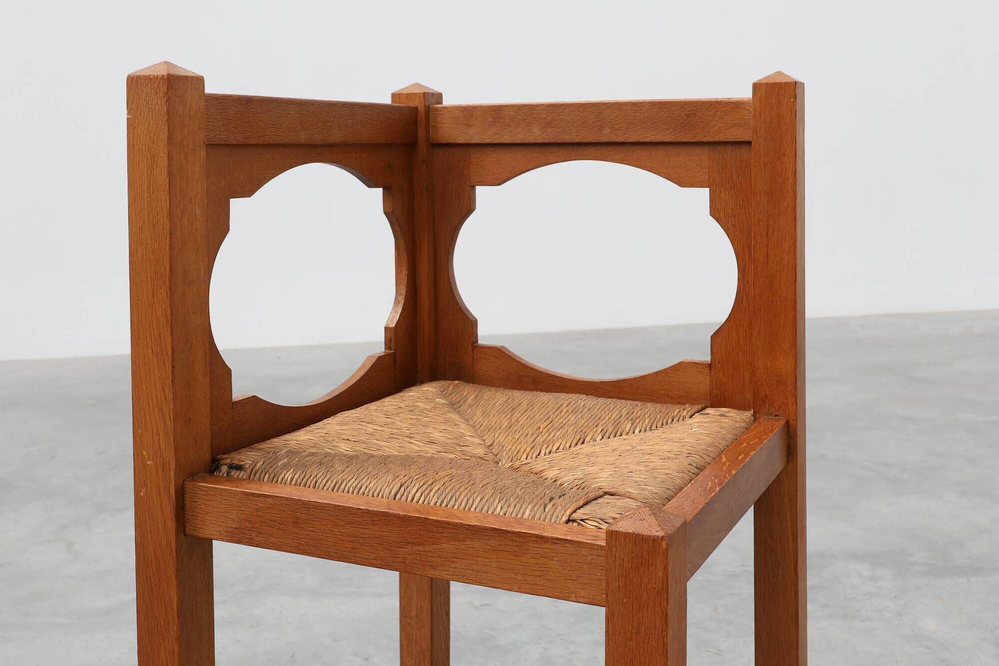 Art Deco Oak Corner Chair with Cut‑Out Backrest and Rush Seat, Belgium, cir