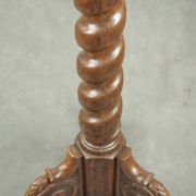 Antique tall oak plant/side table with wood carving and a turned leg