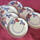 Set of 7 porcelain dessert plates