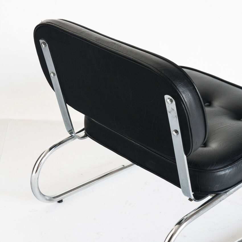 Vintage low armchair. Chrome metal and eskai - Spain, 1970s