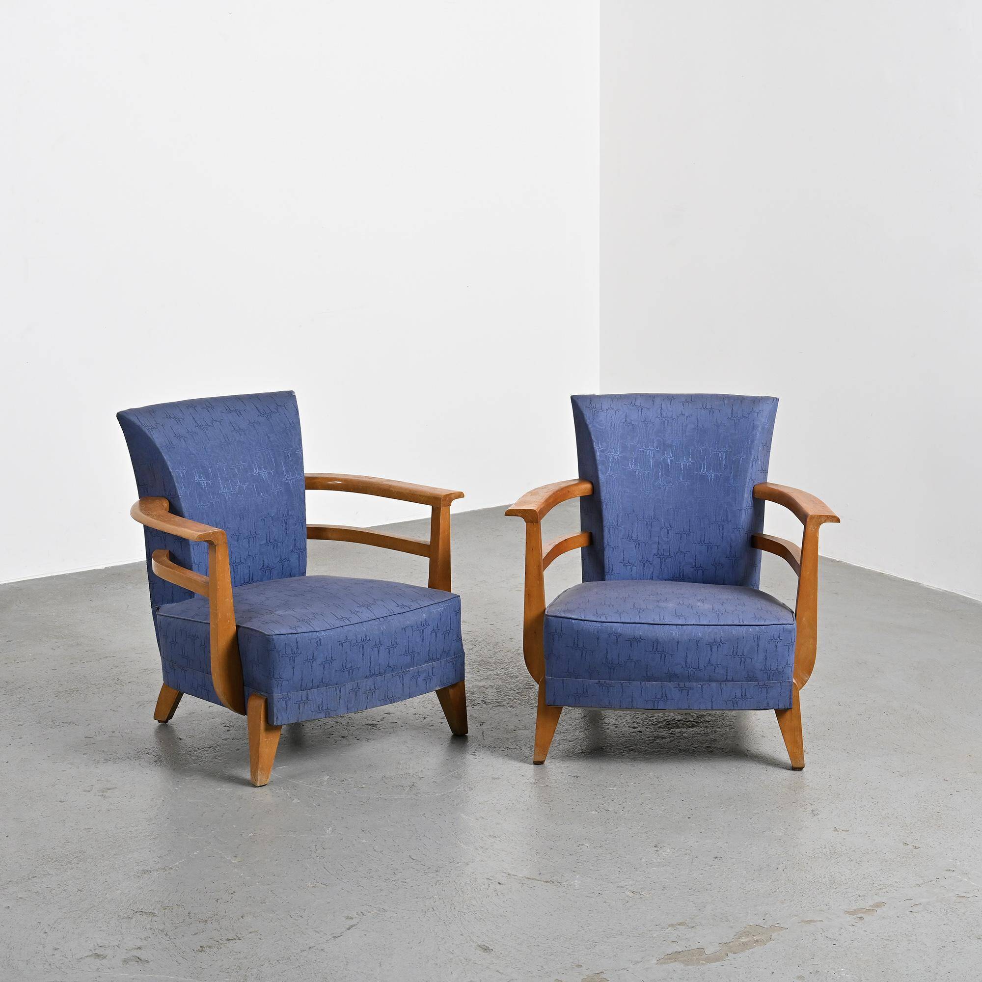 Pair of living room armchairs in solid beech, France, circa 1950.