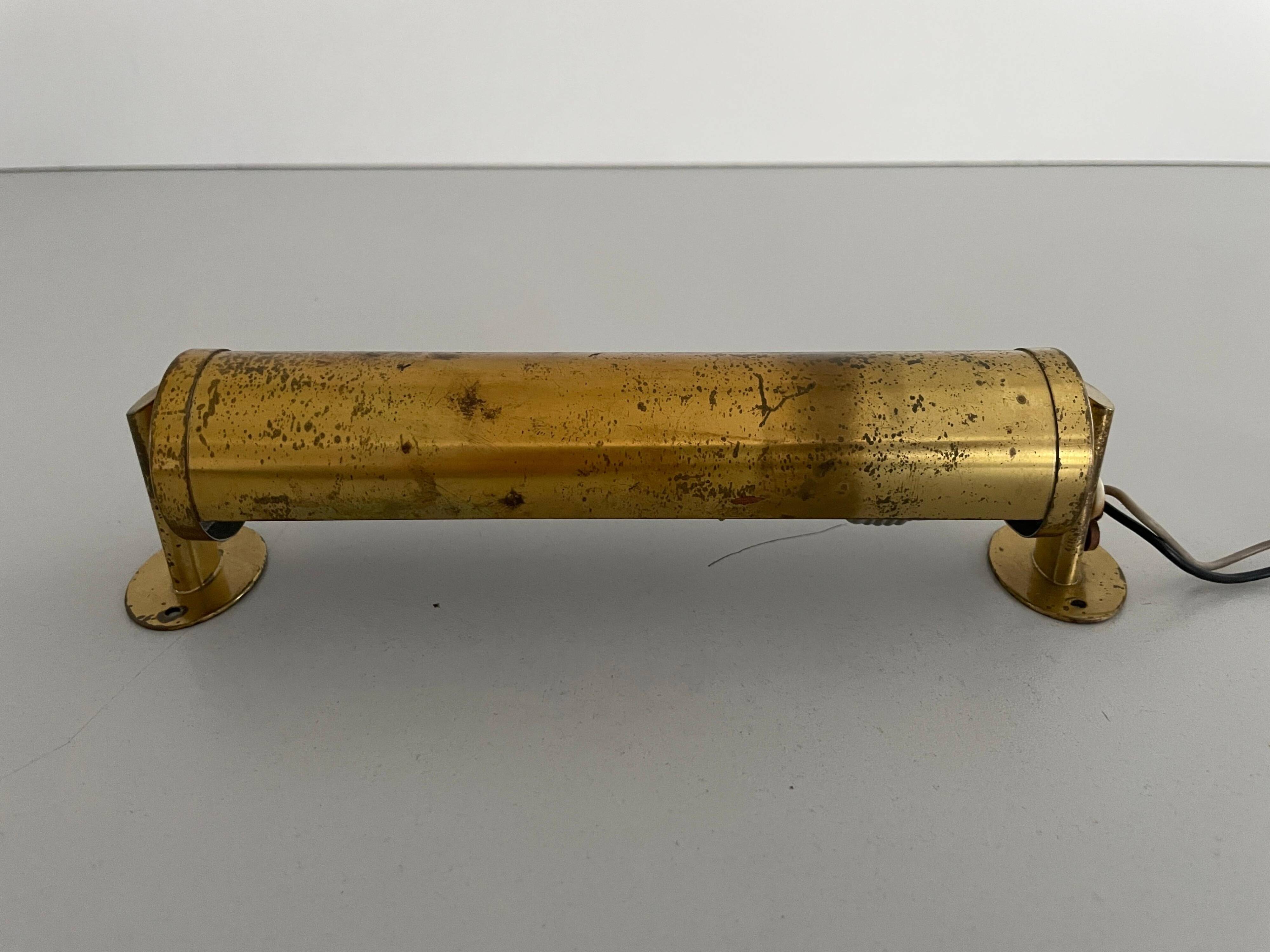Small simple cylindrical brass wall light from the mid-century, 1950s, Germany.