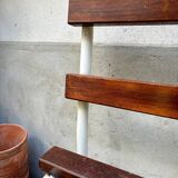 Bench in dark wood and white metal