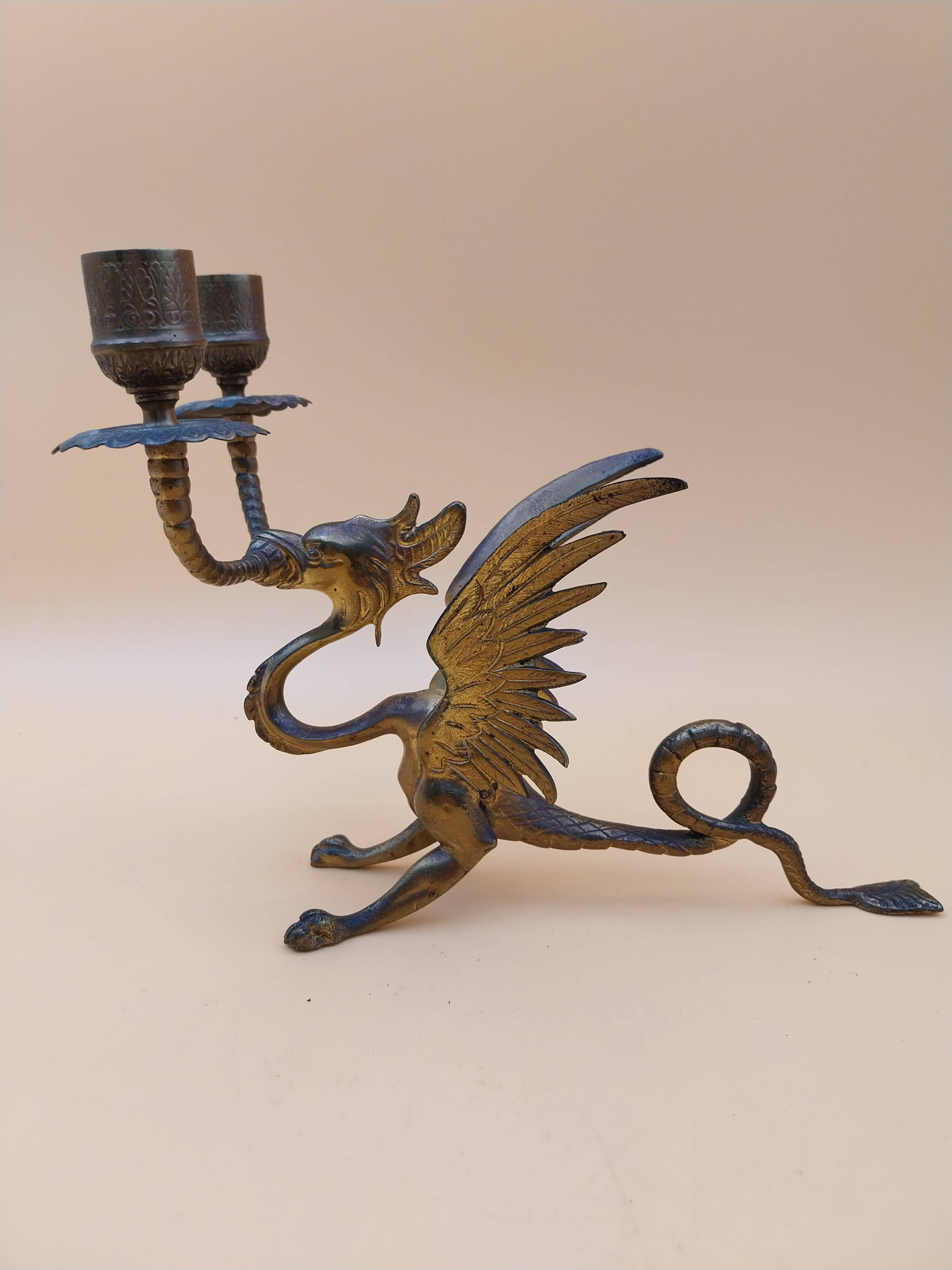 Pair of bronze candlesticks with chimera dragons