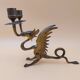 Pair of bronze candlesticks with chimera dragons