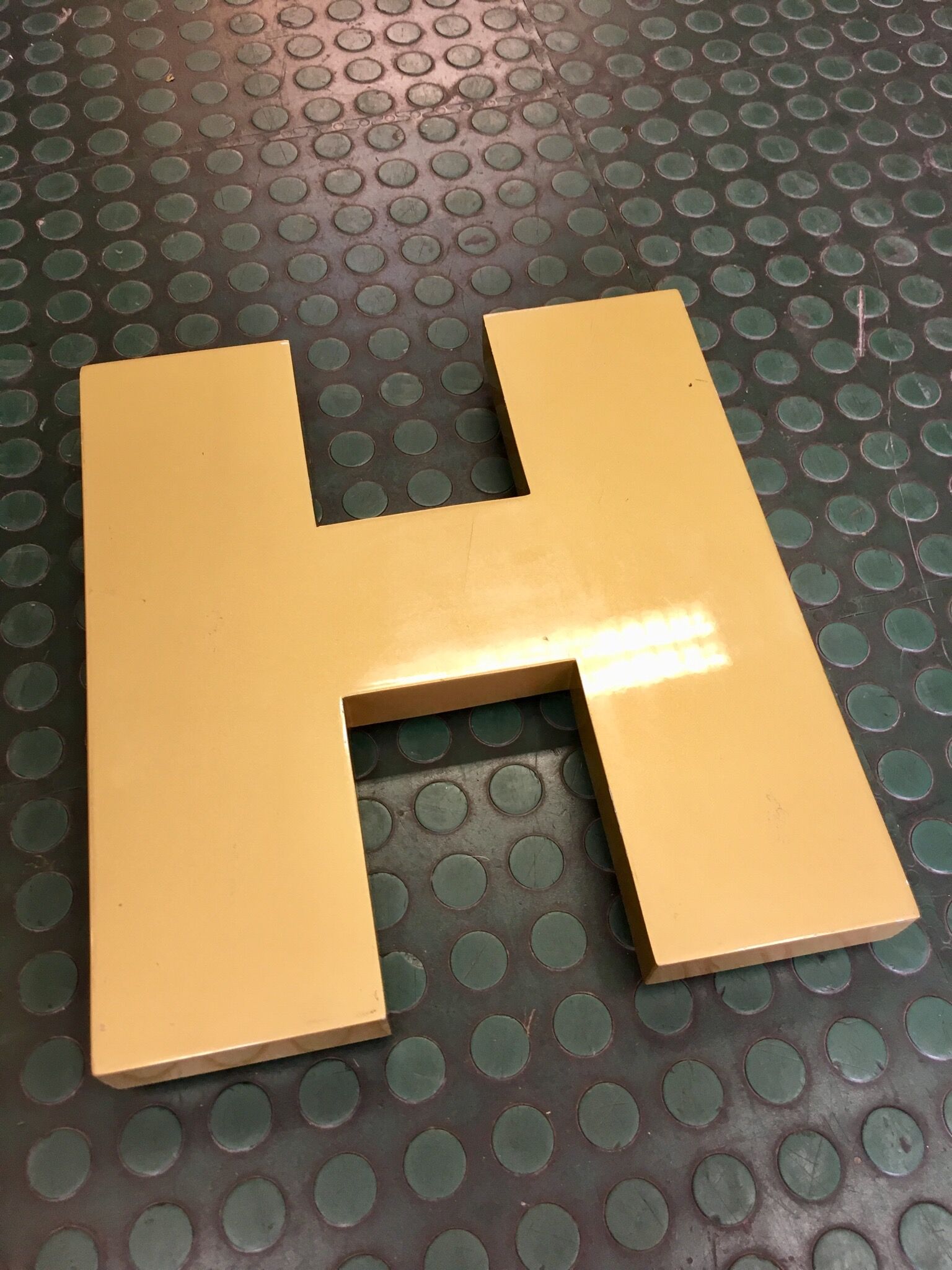 Golden sign letter h