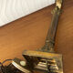 Ancient lamp foot candlestick corinthian column in bronze
