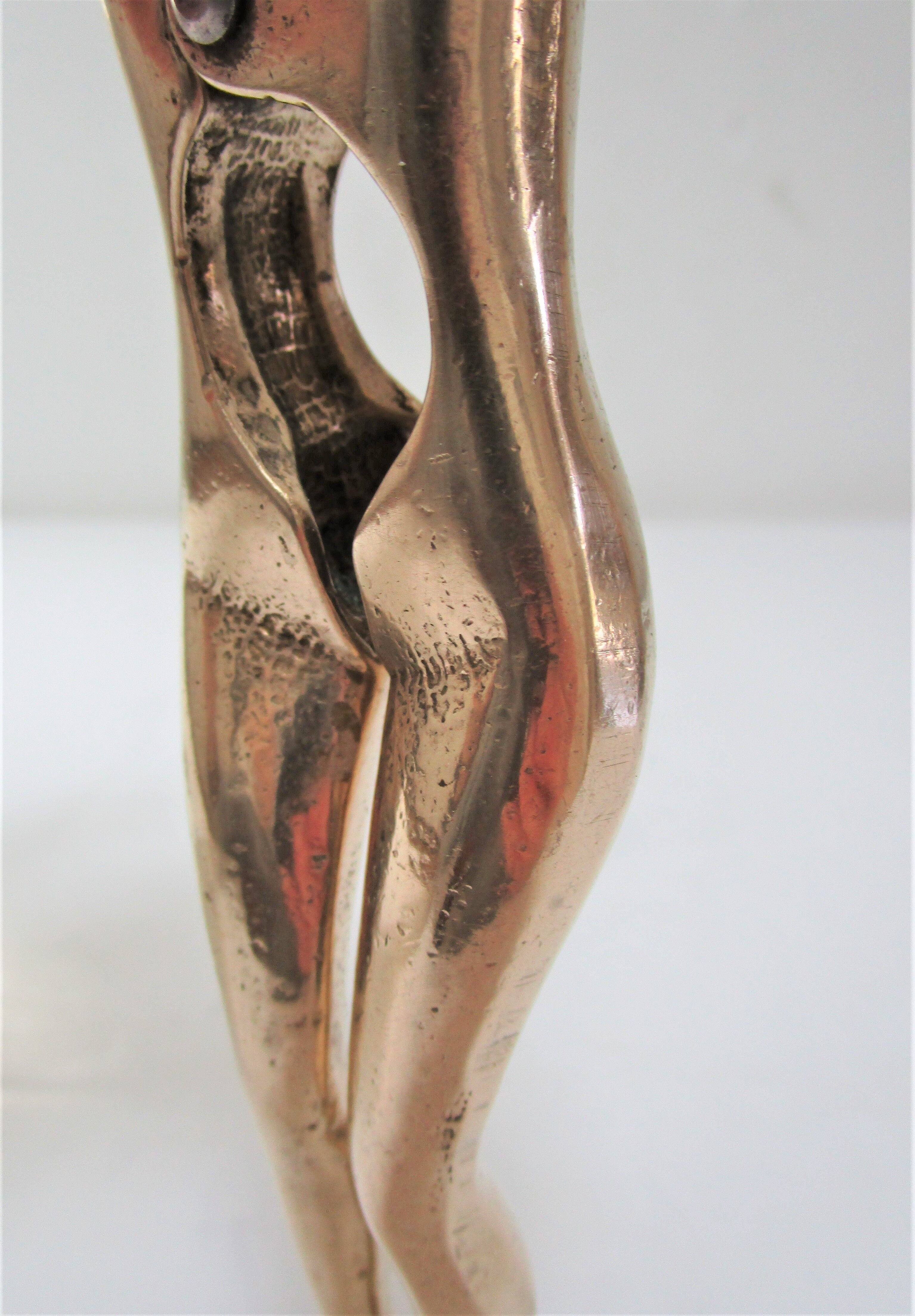 Massive brass anthropomorphic nutcracker vintage woman legs