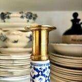 Candlestick in gilded brass and blue earthenware