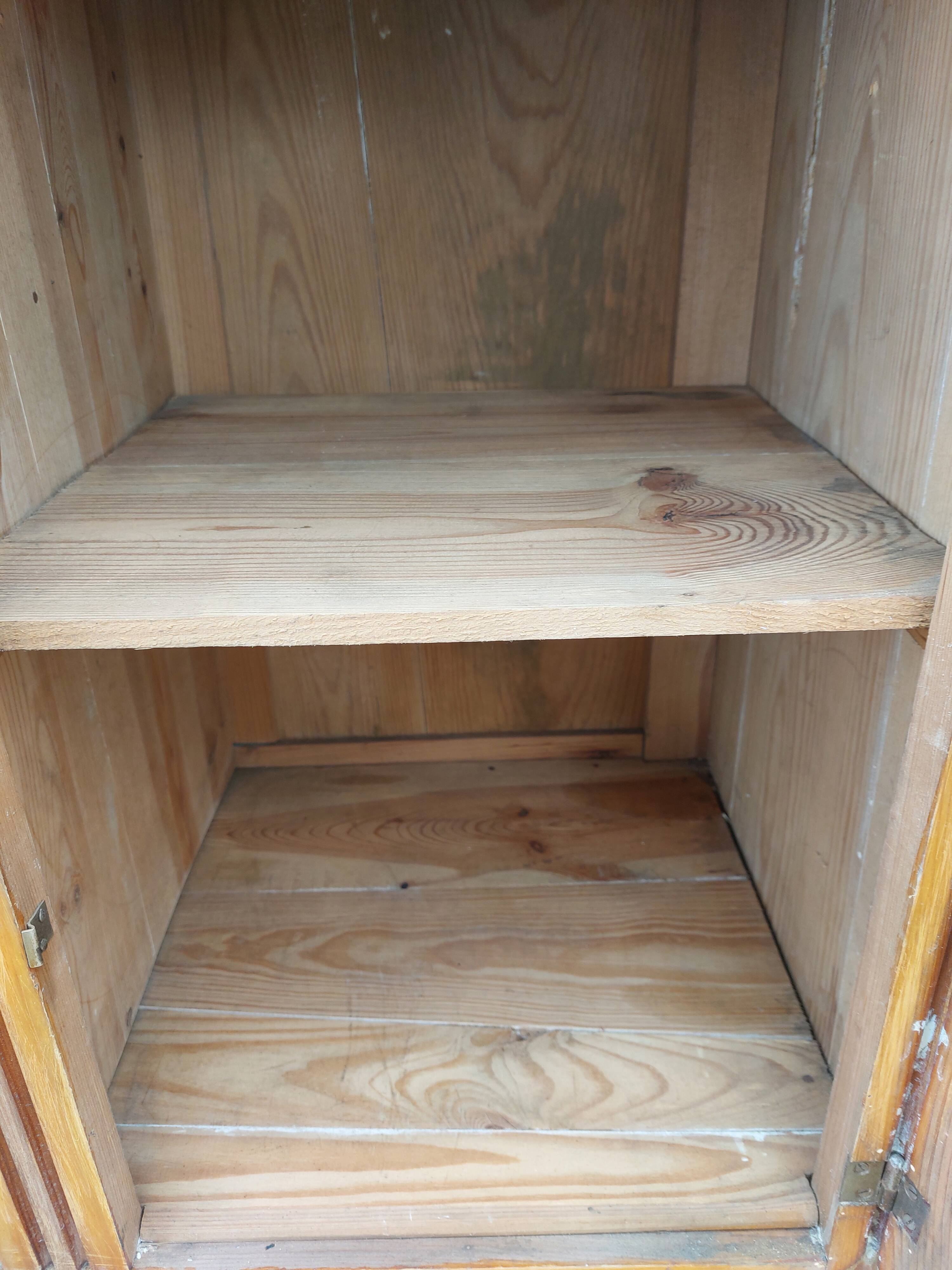 Vintage wooden buffet with a marble top.