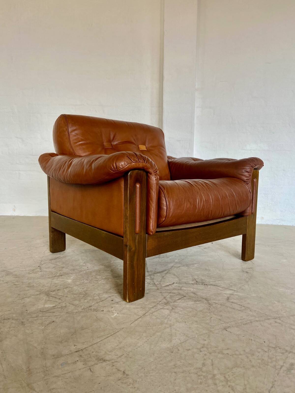Mid-century vintage Scandinavian leather lounge chair in cognac brown leather