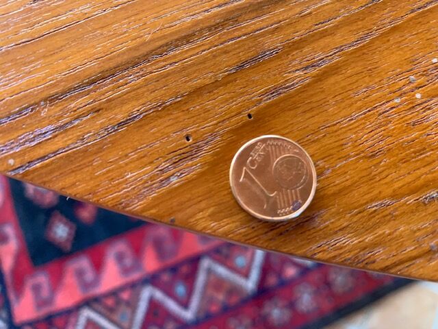 Expandable teak dining table, butterfly extension, circa 60s