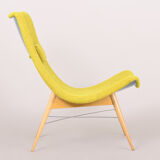 Yellow mid century modern armchair, made in 1950