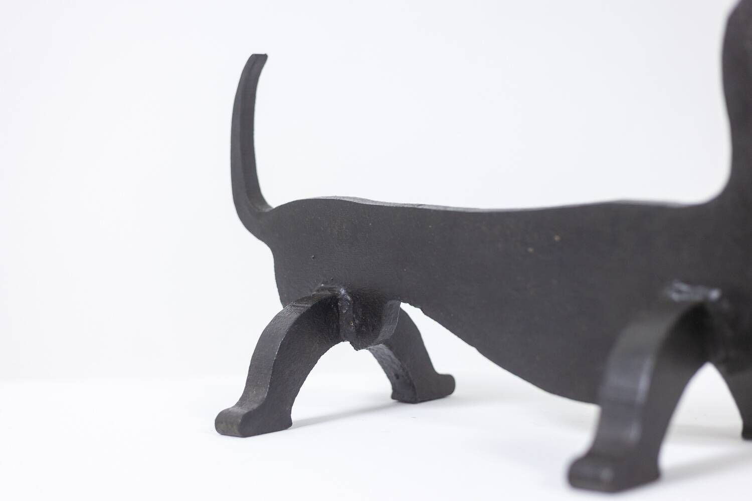 Edouard Shenck. Pair of zoomorphic andirons in wrought iron. 1950s.