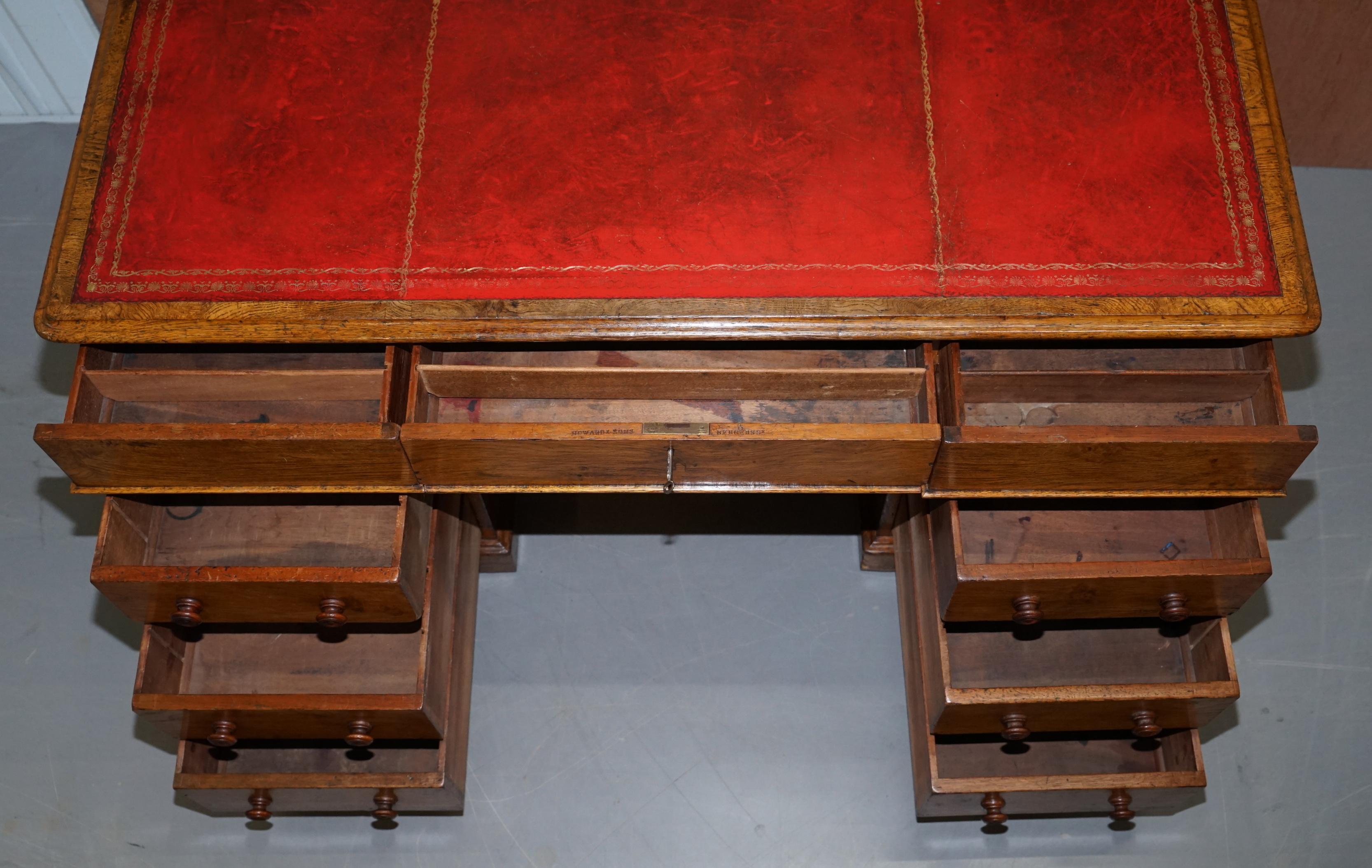 Rare oak partner's desk by Howard & Sons circa 1880 with leather.