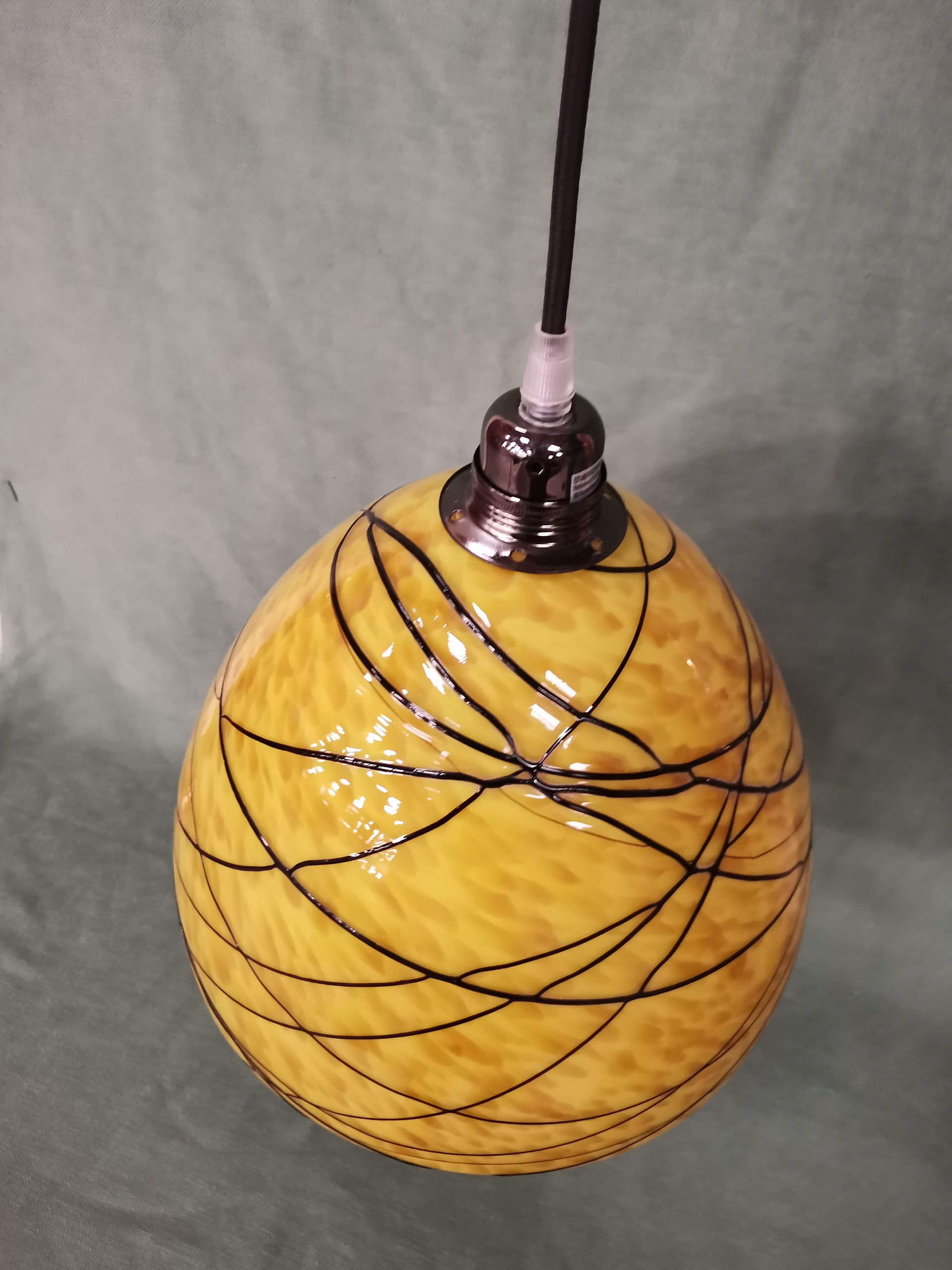 Suspension in yellow Clichy glass and black border