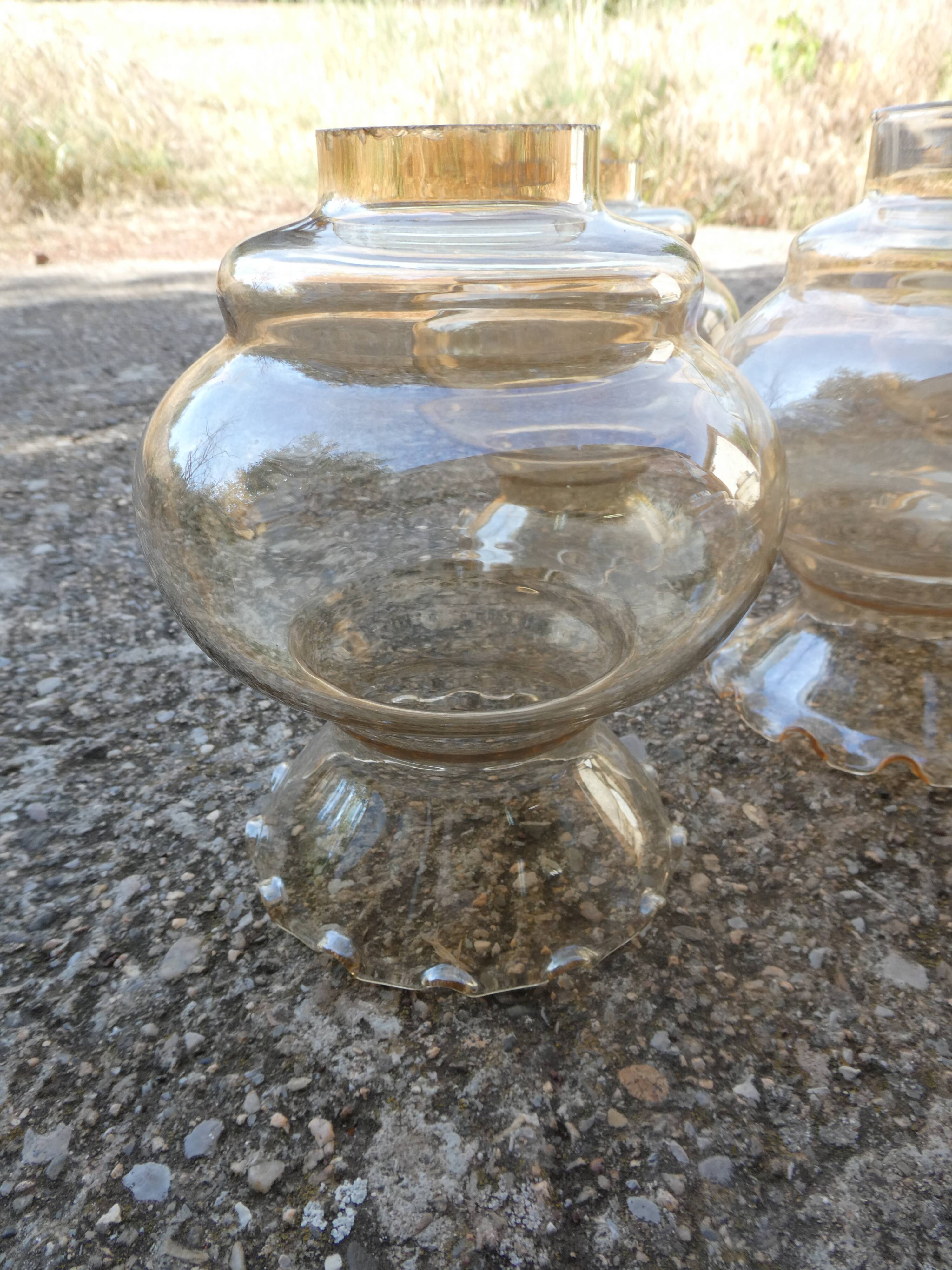 Set of 6 amber glass globes.