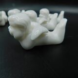 8 porcelain knife rests - Cherubs