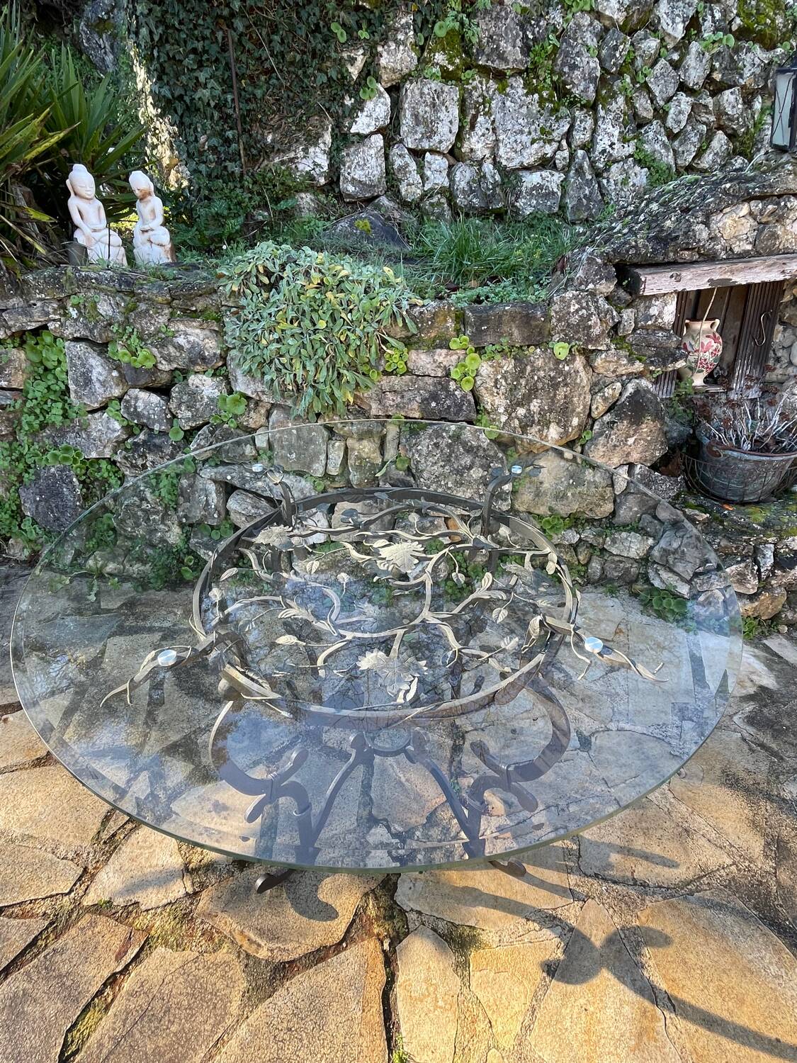 Round wrought iron table for 6 people