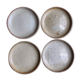 Lot de quatre assiettes en grès
