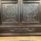 Blackened wooden display cabinet from the late 19th or early 20th century.