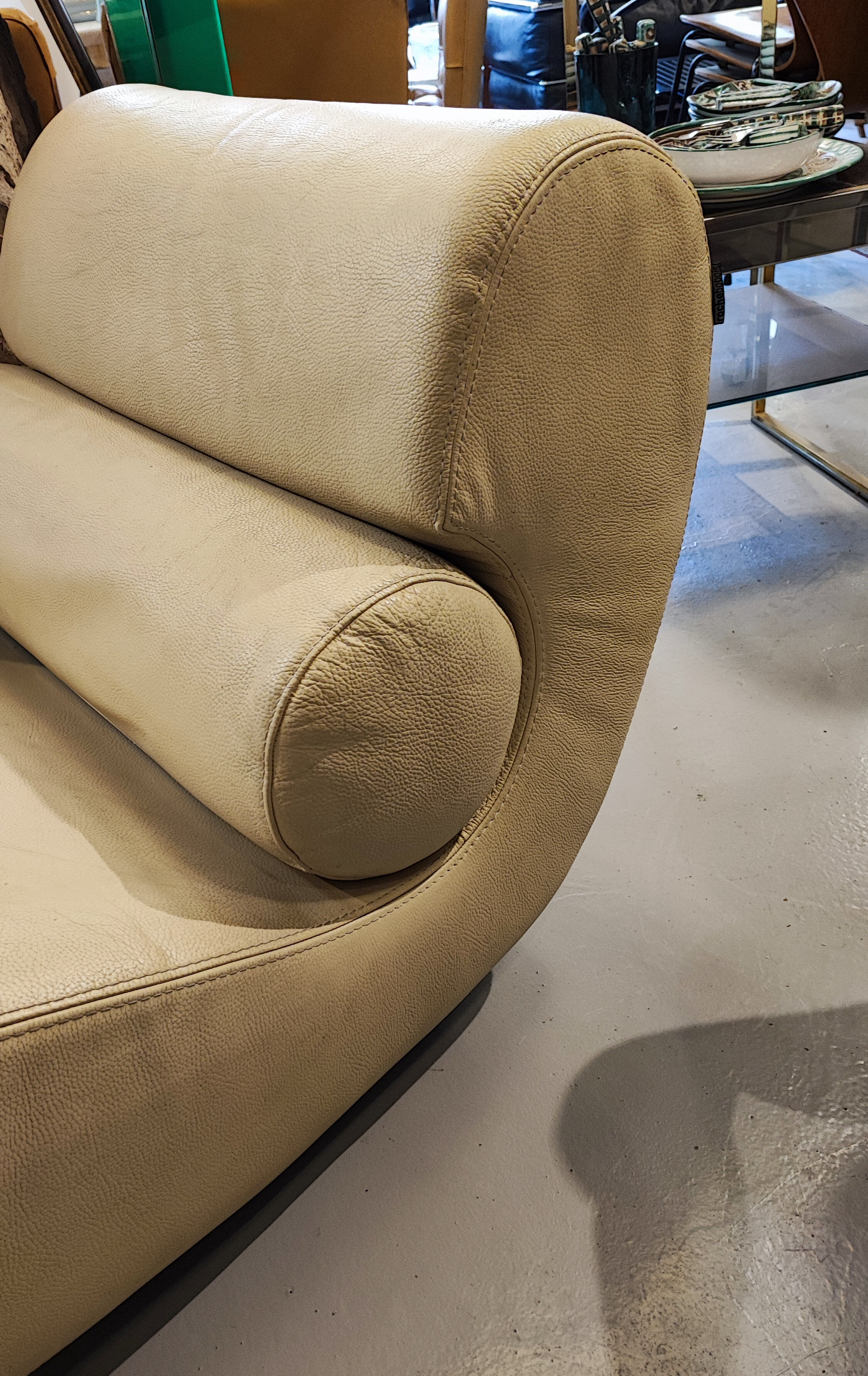 Armchair and footrest Comgule Roche Bobois leather