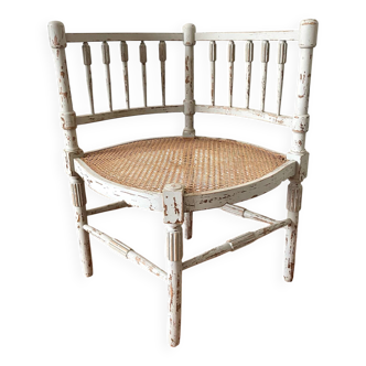 19th-century corner fireplace armchair, wood and cane.