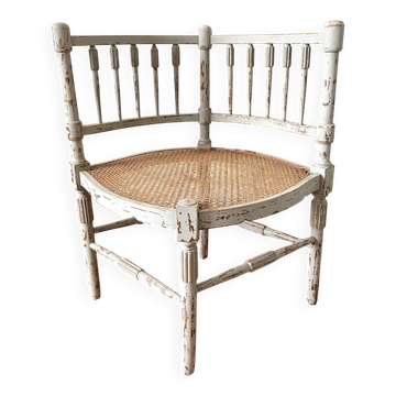 19th-century corner fireplace armchair, wood and cane.
