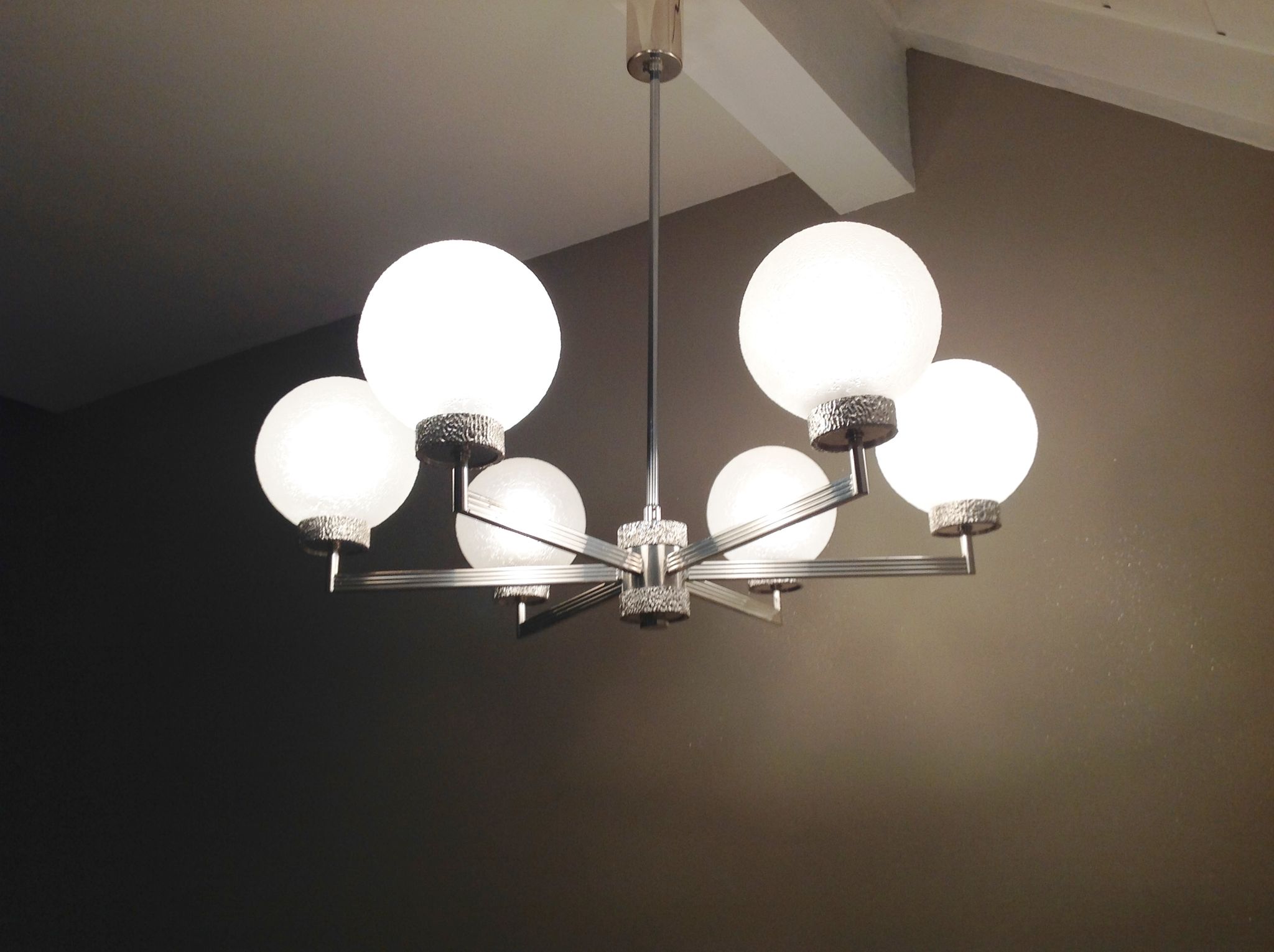 Six-light chrome metal chandelier and opaque glass globes / vintage 60s and 70s