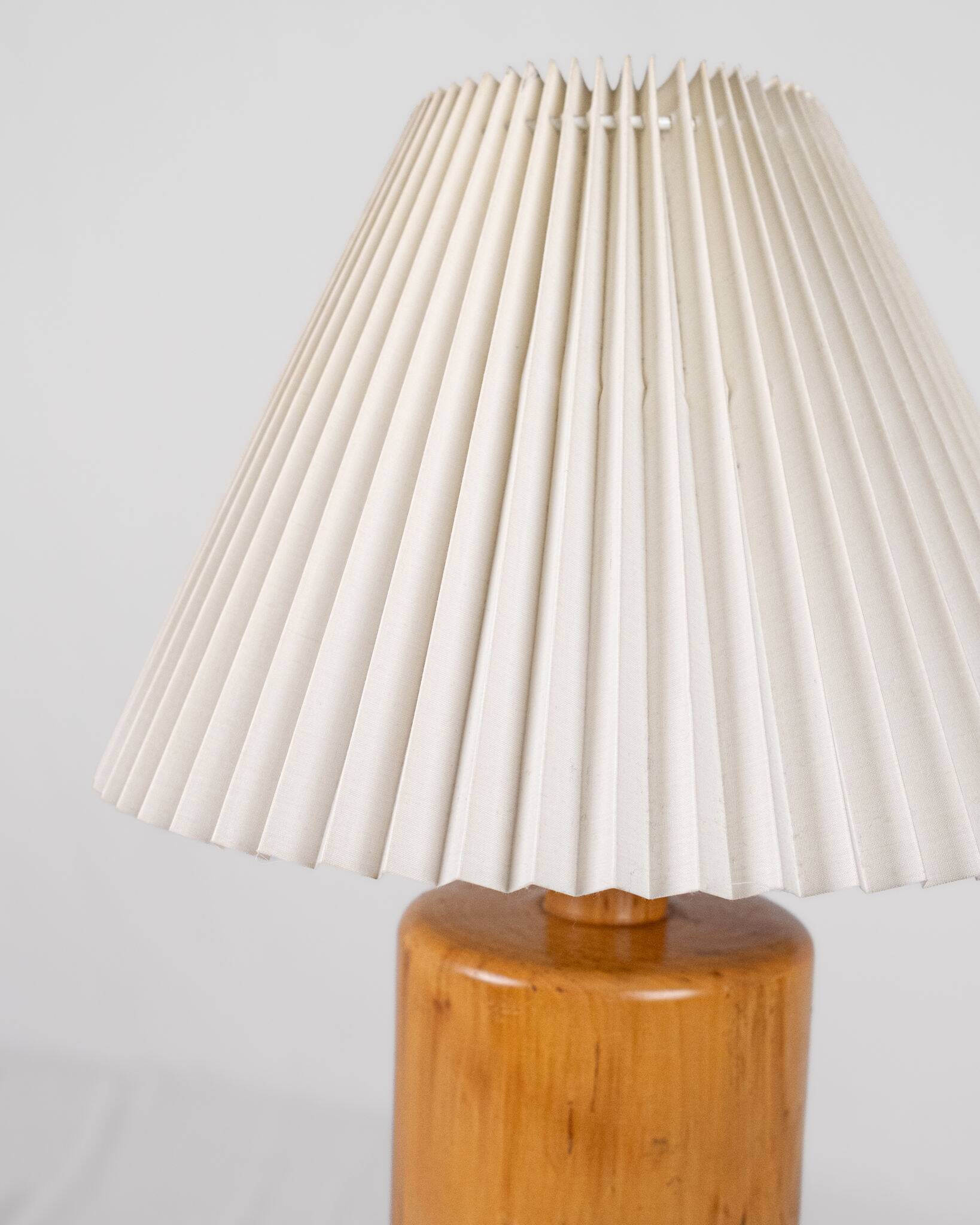 Cylindrical table lamp made of solid turned wood, France, 1970.