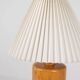 Cylindrical table lamp made of solid turned wood, France, 1970.