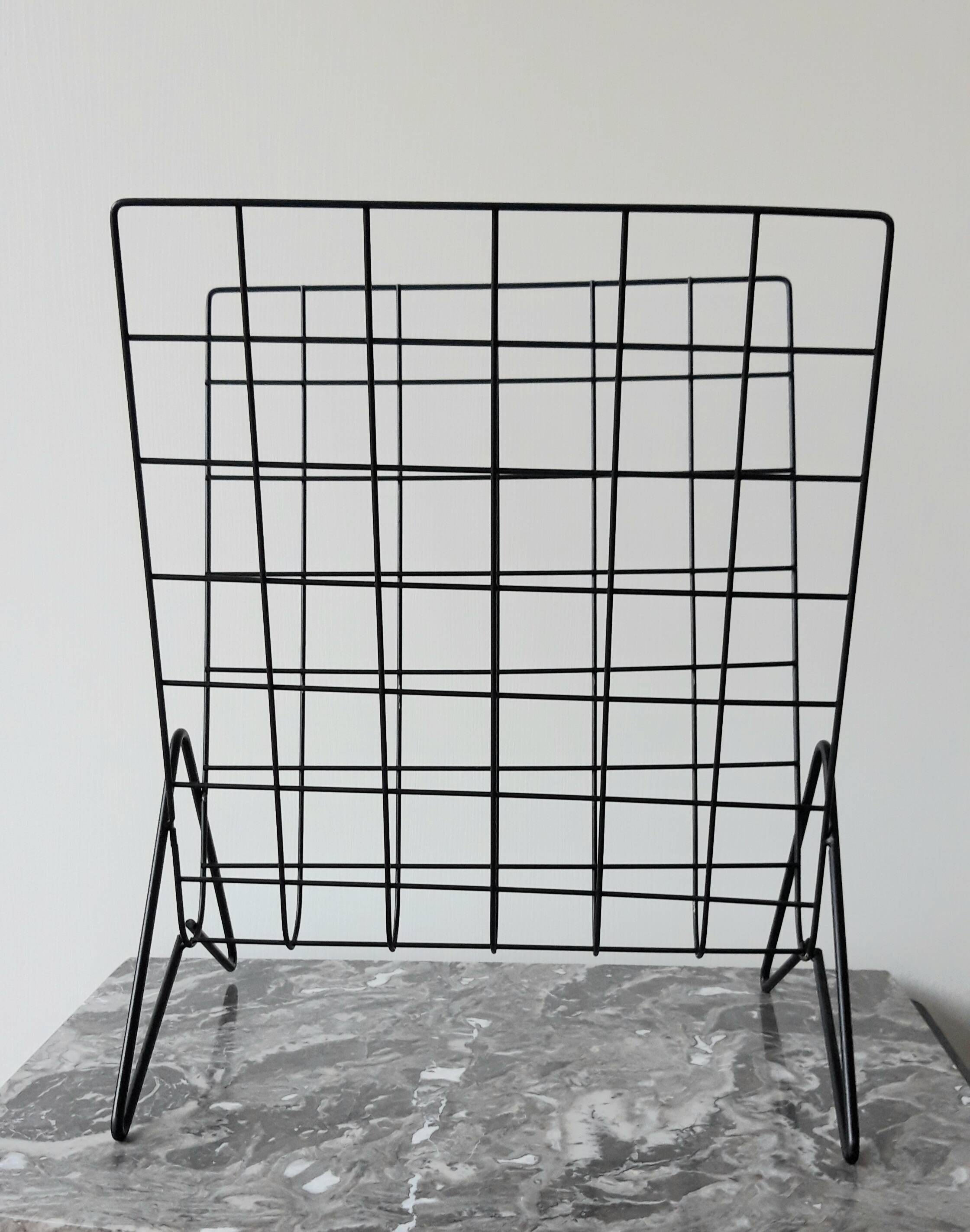 Vintage metal magazine rack
